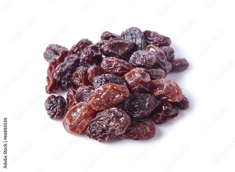 pile of raisins on white background pile of raisins on white background