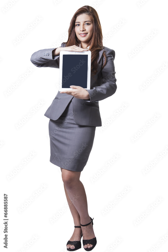Young businesswoman showing digital tablet Young businesswoman showing digital tablet