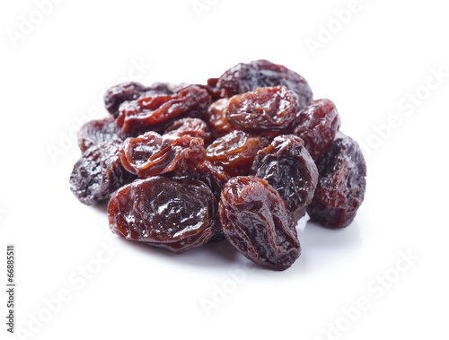 pile of raisins on white background