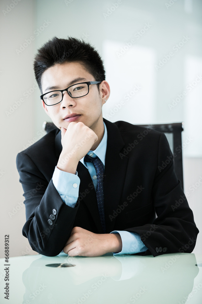 Image of young handsome confident businessman in suit Image of young handsome confident businessman in suit
