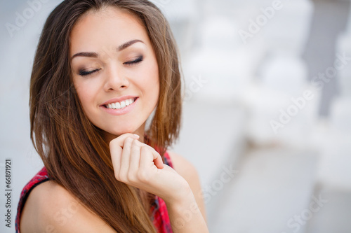 Beautiful young woman outdoors. Free Download Beautiful young woman outdoors. - GFXLoad