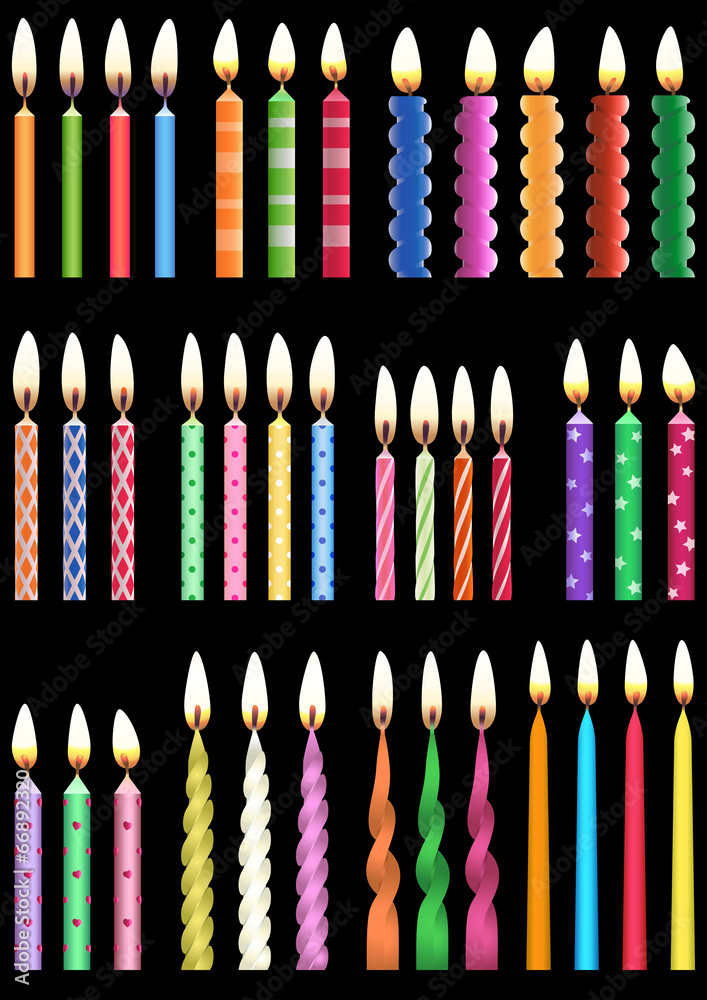 Colorful birthday candles on black background
