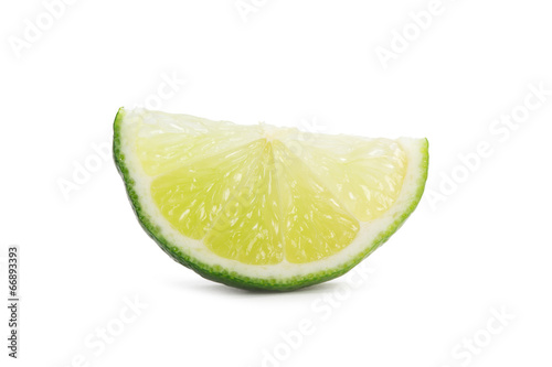 slice of lime over white background