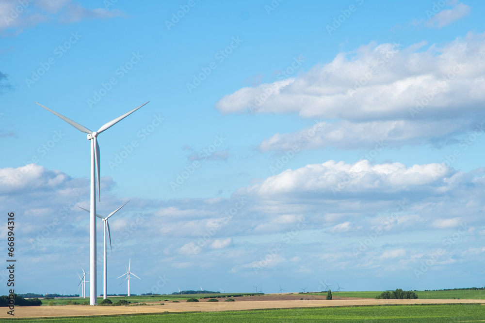 Wind generator turbine on summer landscape Wind generator turbine on summer landscape