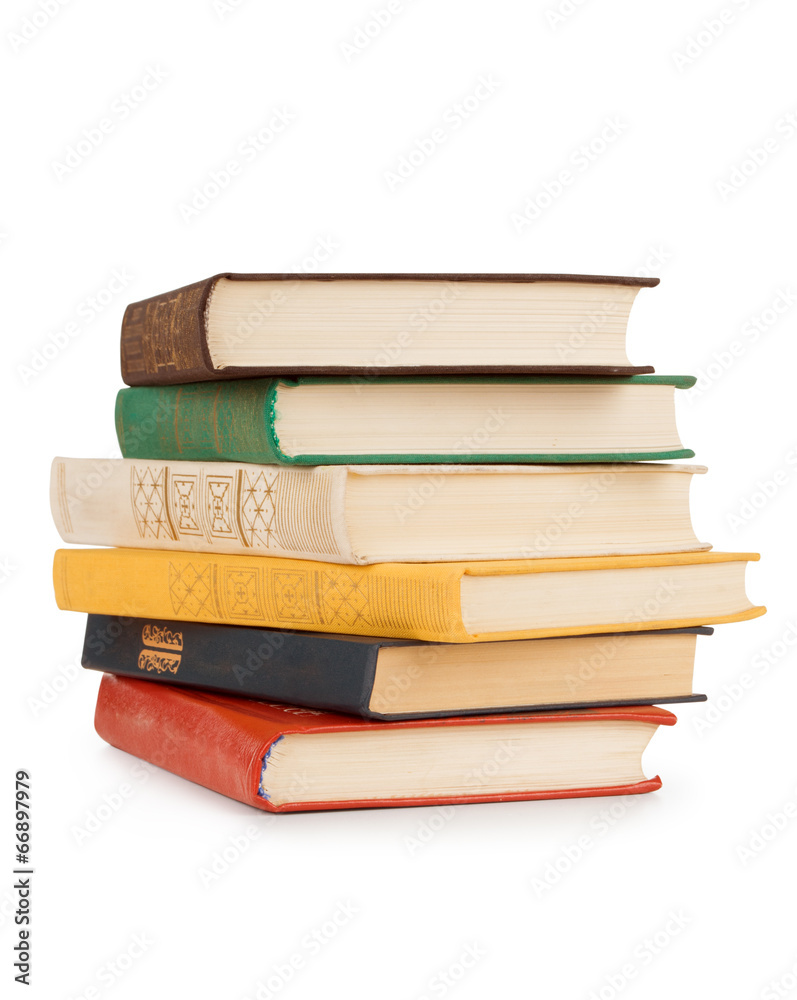 old books stacked in a pile on a white background old books stacked in a pile on a white background
