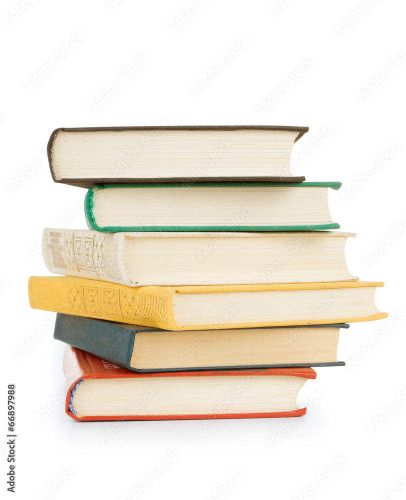 old books stacked in a pile on a white background old books stacked in a pile on a white background