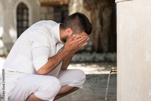 Islamic Religious Rite Ceremony Of Ablution Face Washing