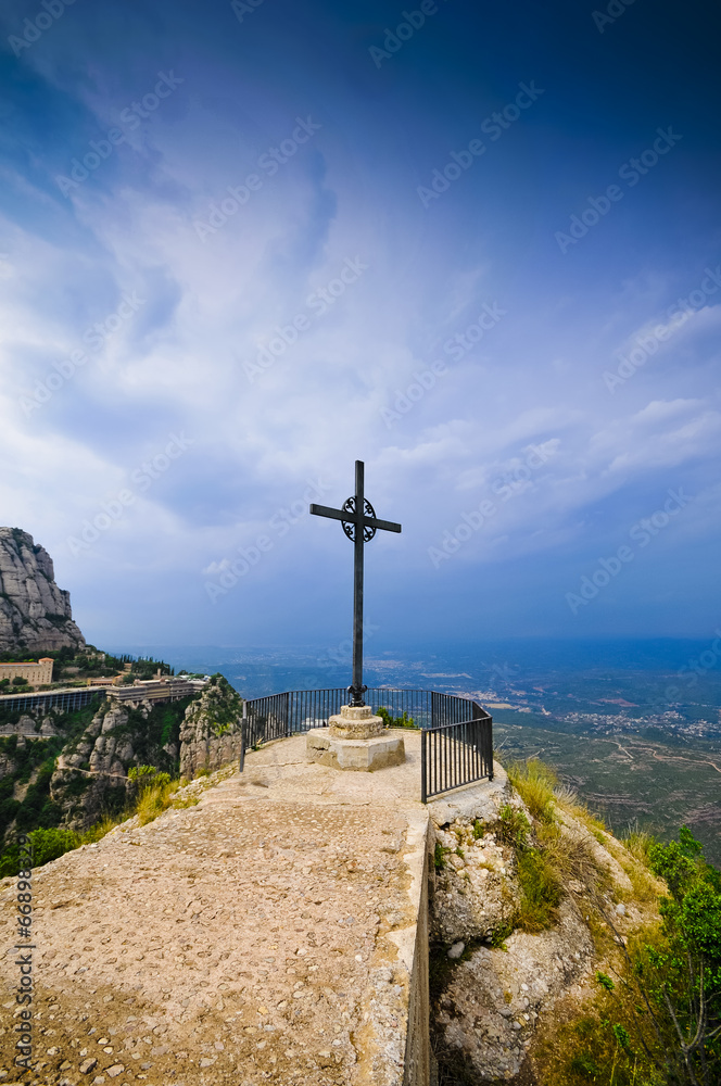 Cross on the cliff Montserrat mountain