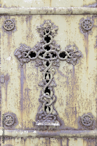 Old rusty metal cross