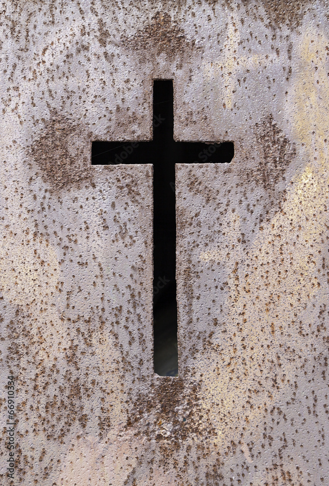 Old rusty metal cross