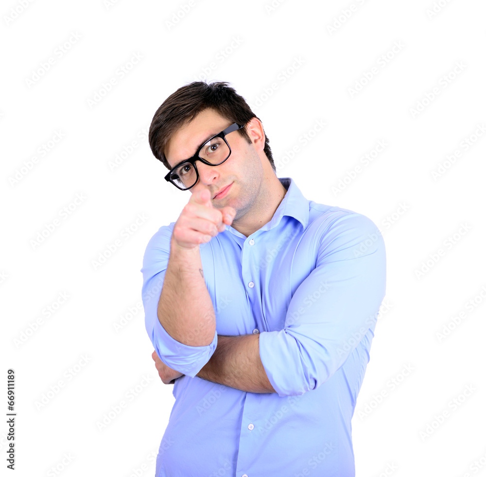 Portrait of handsome young man pointing to the camera isolated o