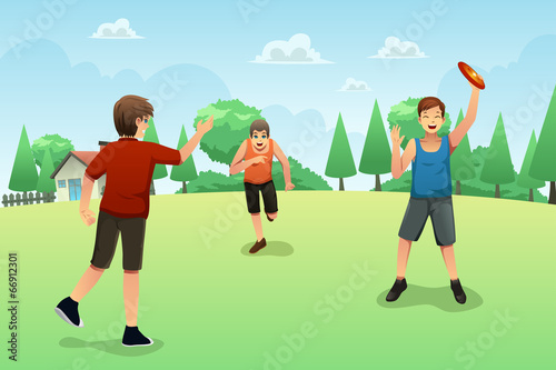 Young people playing frisbee