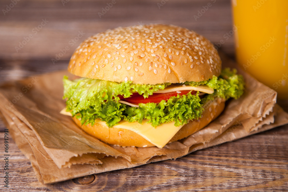 Delicious hamburger on a wooden table