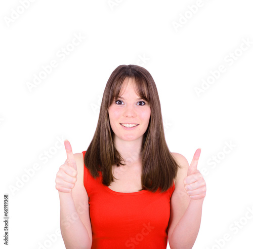 Portrait of happy woman with thumbs up against white background