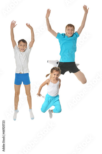 Two boys and girl exercising