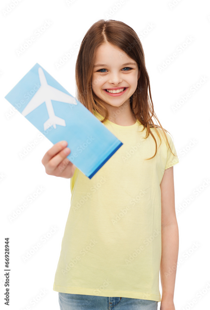 smiling little girl with airplane ticket smiling little girl with airplane ticket