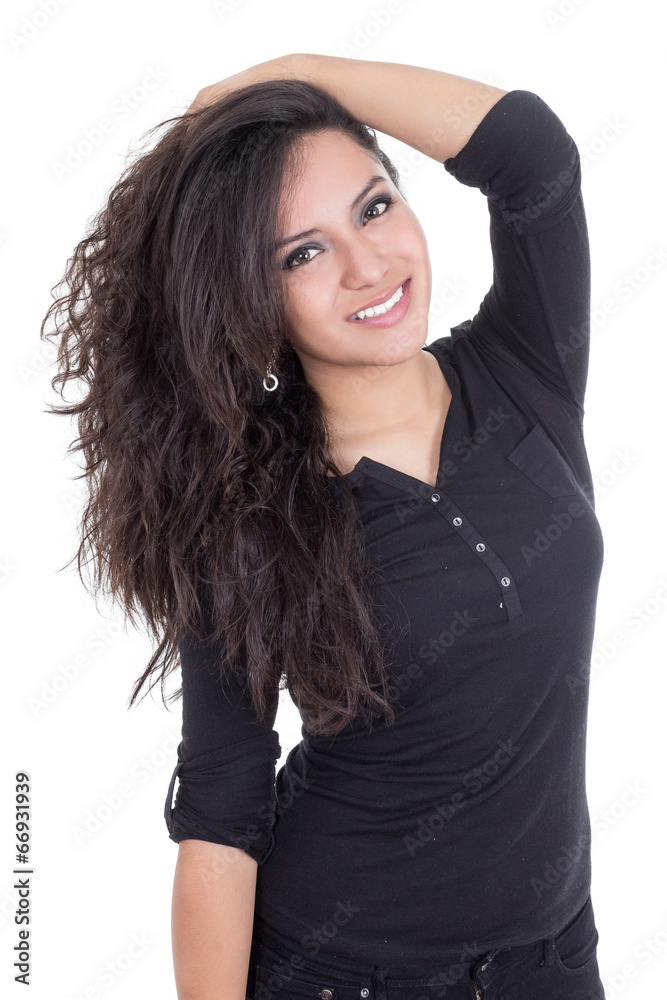 latin girl posing with brown hair on one side Stock Photo
