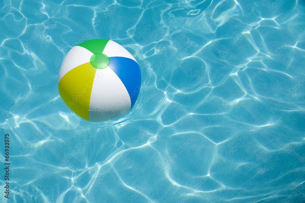 Beach Ball Floating in Pool