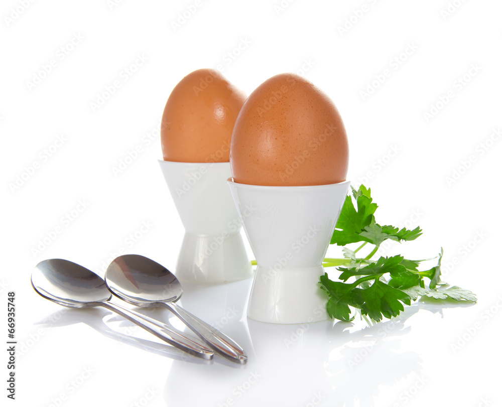 Support with eggs, teaspoons and the parsley Support with eggs, teaspoons and the parsley