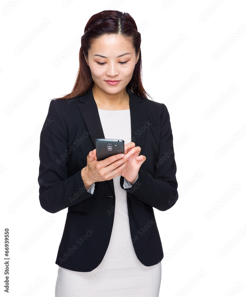Asian business woman look at mobile phone Asian business woman look at mobile phone