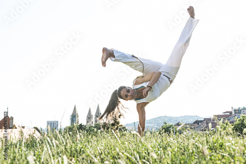 Capoeira woman, awesome stunts in the outdoors