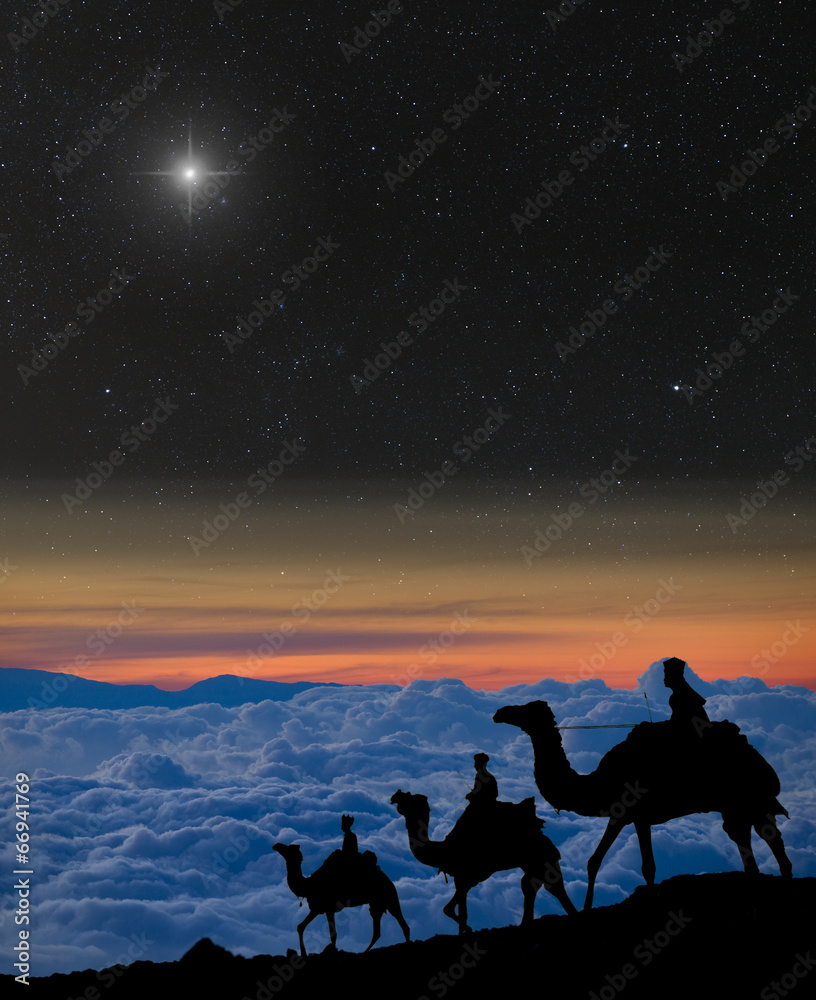 The 3 wise men follow Christmas star over the mountains. The 3 wise men follow Christmas star over the mountains.