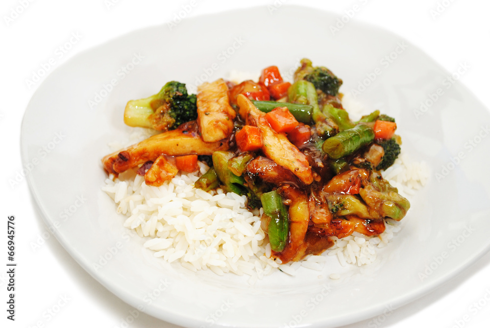 Chicken and Vegetables Stir Fry Served on White Rice Chicken and Vegetables Stir Fry Served on White Rice