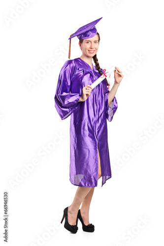 Female graduate student holding a diploma