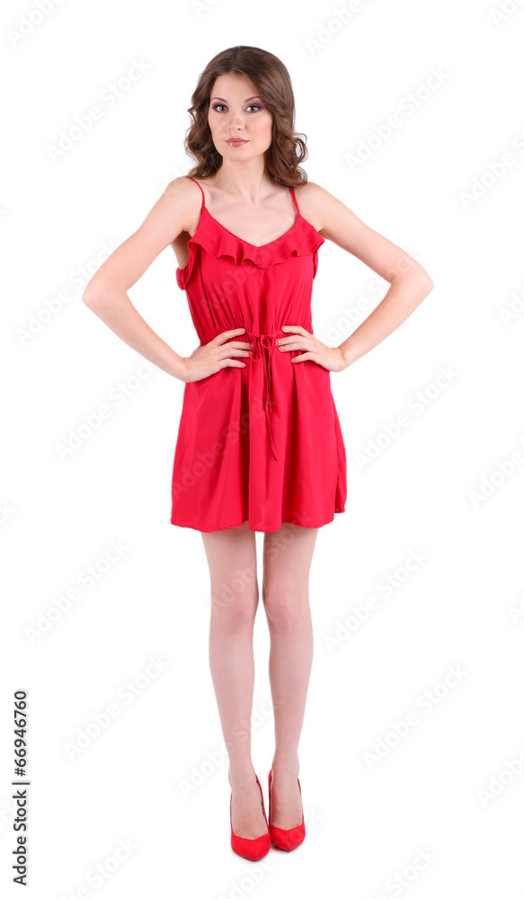 Beautiful young girl in red dress isolated on white
