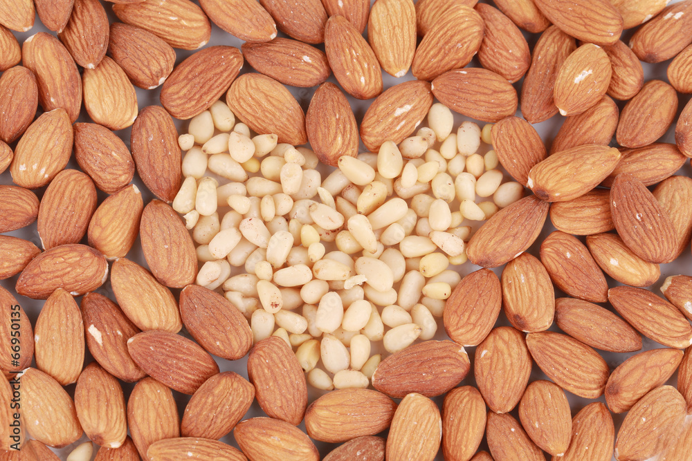 Heart shape of almonds and pine nuts. Heart shape of almonds and pine nuts.