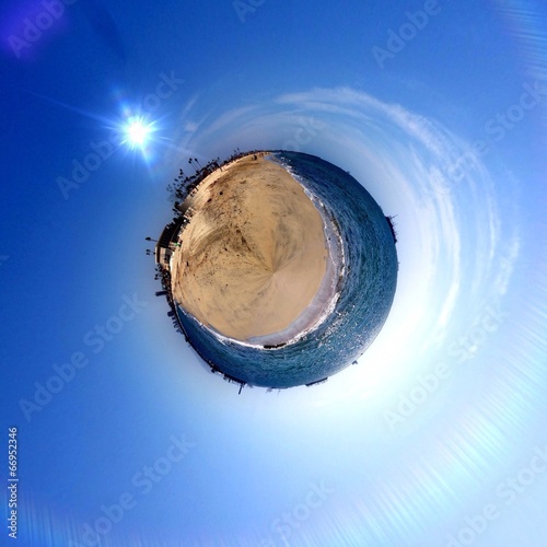 Abstract Sunset at the beach in a circular shape photo