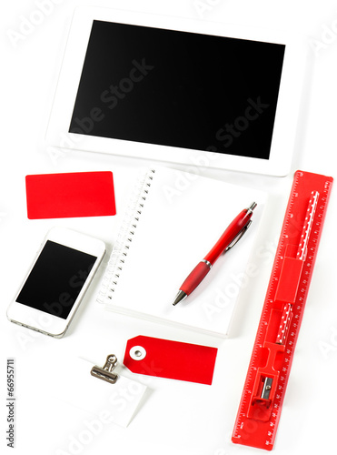 office and school supplies over white background