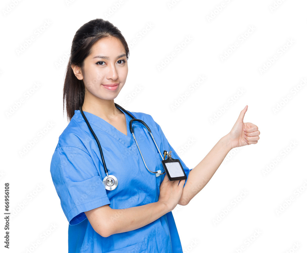Asian female doctor with thumb up