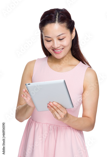 Asian woman look at tablet
