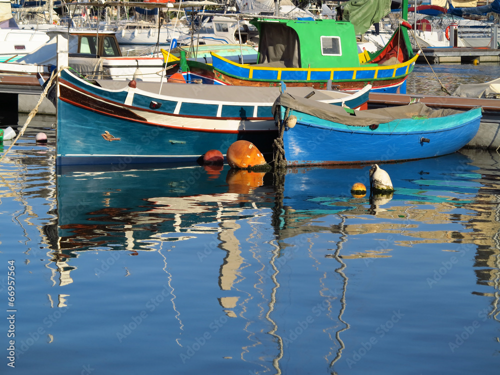 Colourful painted fishing boats in Msida creek harbour, Malta