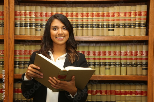 Female law student in law library