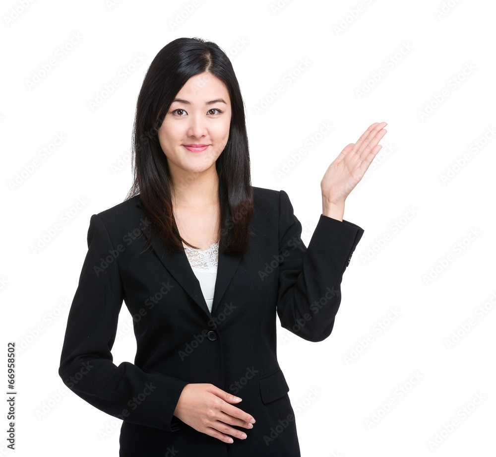 Asian business woman with hand presentation Asian business woman with hand presentation