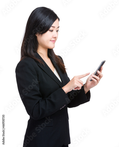 Business woman finger touch on mobile phone