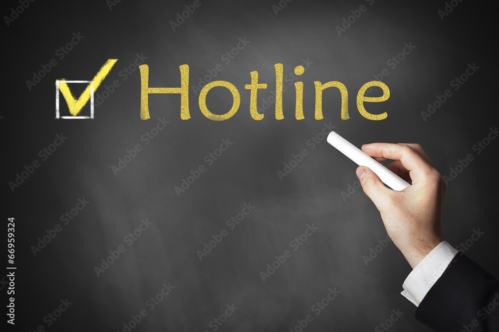 hand writing hotline on chalkboard hand writing hotline on chalkboard