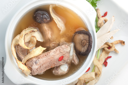 Traditional oriental pork broth with mushrooms