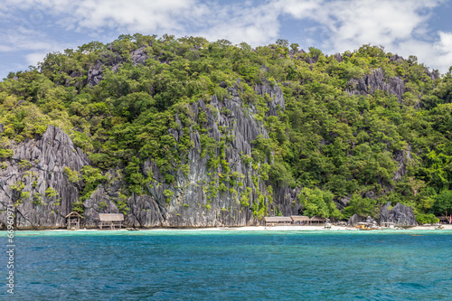 Limestone rock and white sand beach in Palawan Philippines © pcalapre
