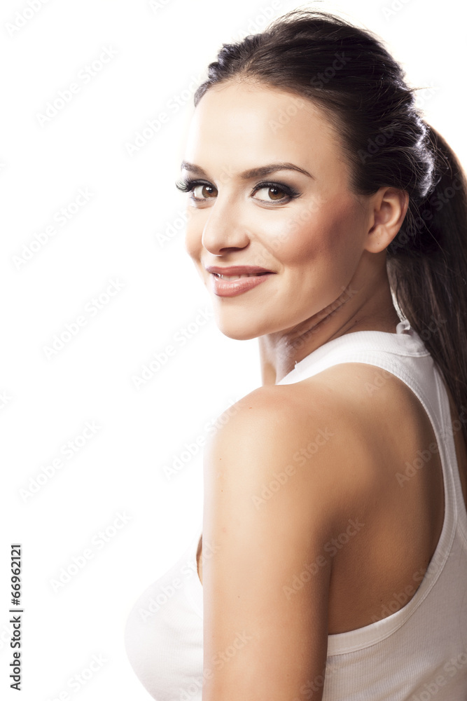 smiling beautiful young woman posing on a white background smiling beautiful young woman posing on a white background