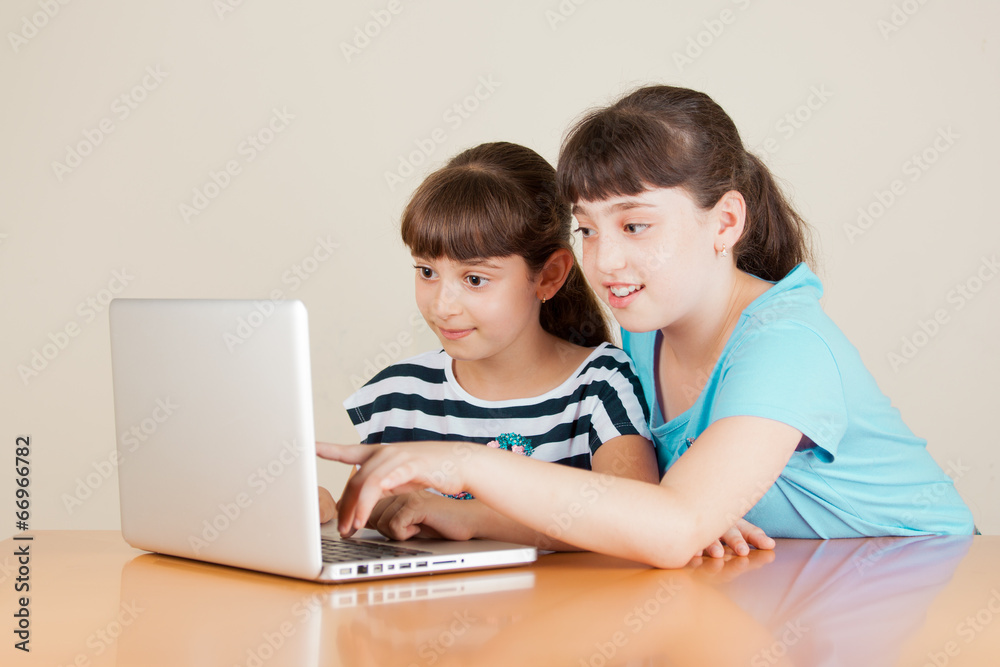 Two girls with laptop