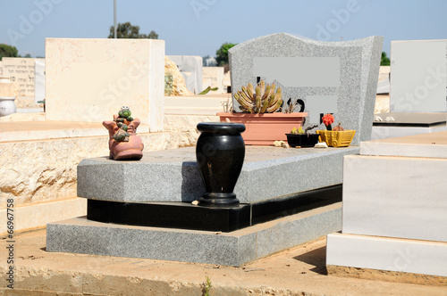 Ταπετσαρία Gray marble gravestone at jewish cemetery in the central Israel