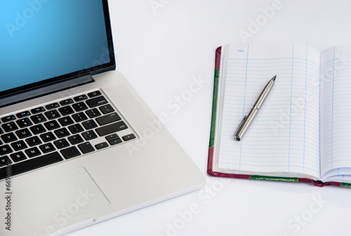 Coffee cup and laptop for business.