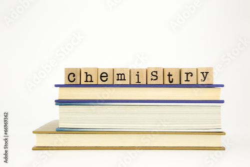 chemistry word on wood stamps and books