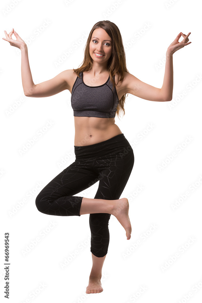 Smiling woman standing on one leg. Smiling woman standing on one leg.