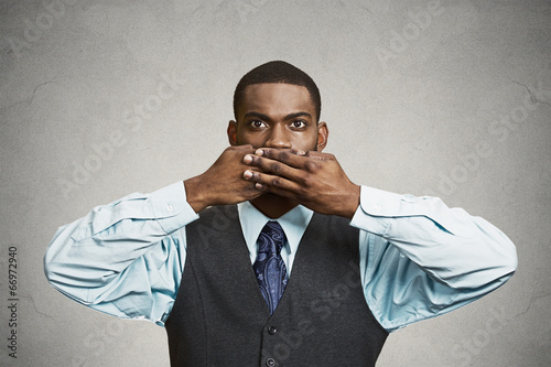 Konstfotografi Man covers his mouth, speak no evil concept
