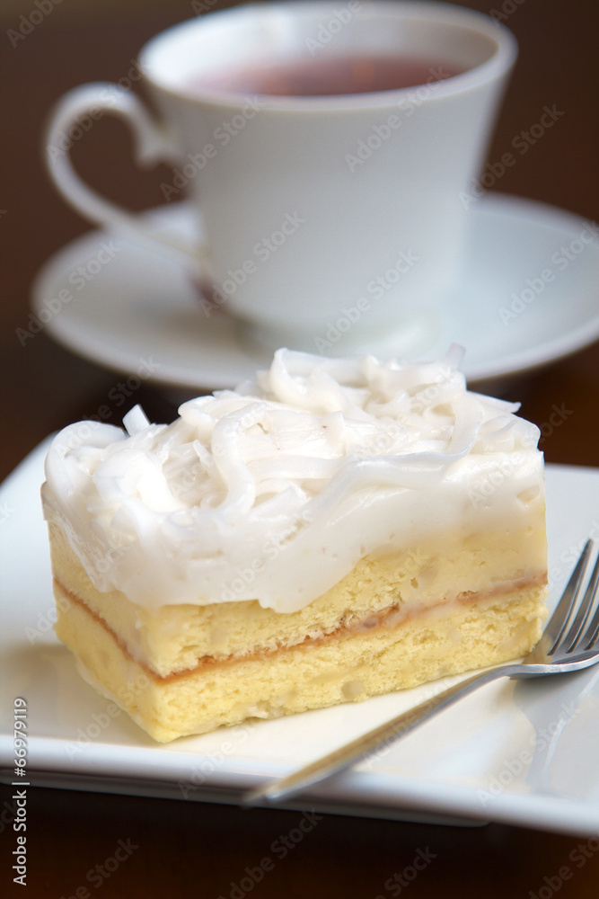 close up coconut cake in white dish close up coconut cake in white dish