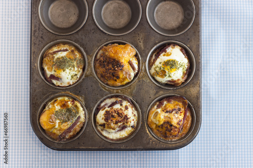 Freshly baked paleo muffins in a pan, overhead view 